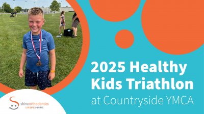 Boy wearing medal and text "2025 Healthy Kids Triathlon at Countryside YMCA"