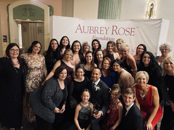 Big group of people smiling for photo
