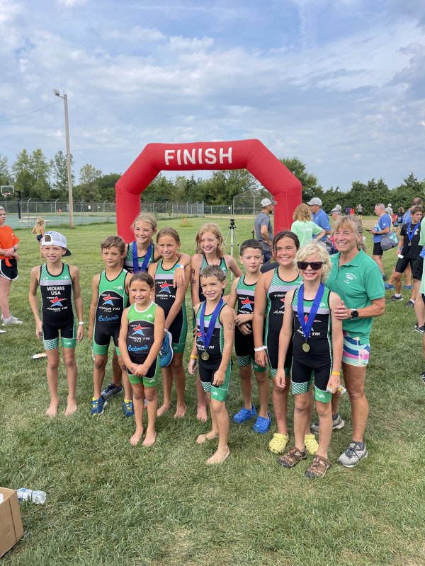 Group of kids with medals after completing a race