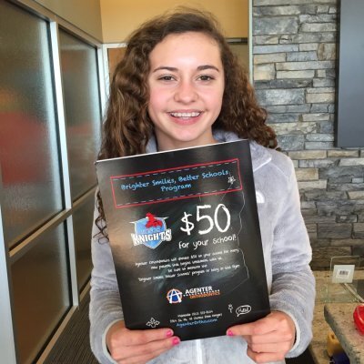 Girl holding phamplet