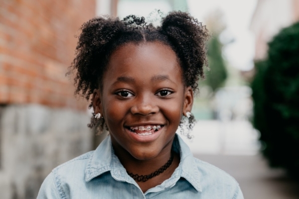 Girl smiling with braces