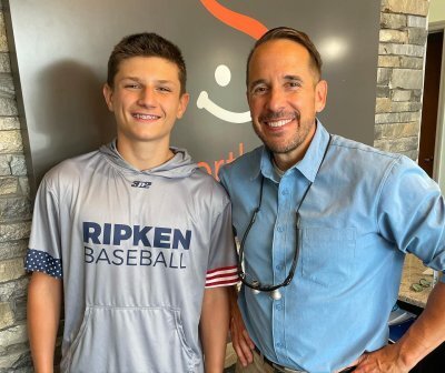 Man smiling with doctor